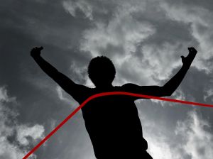 Silhouette of athlete at finish line