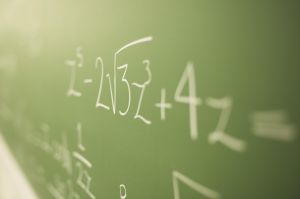 Math problems on chalkboard