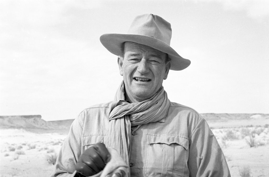 John Wayne on the set of the film Legend of the Lost