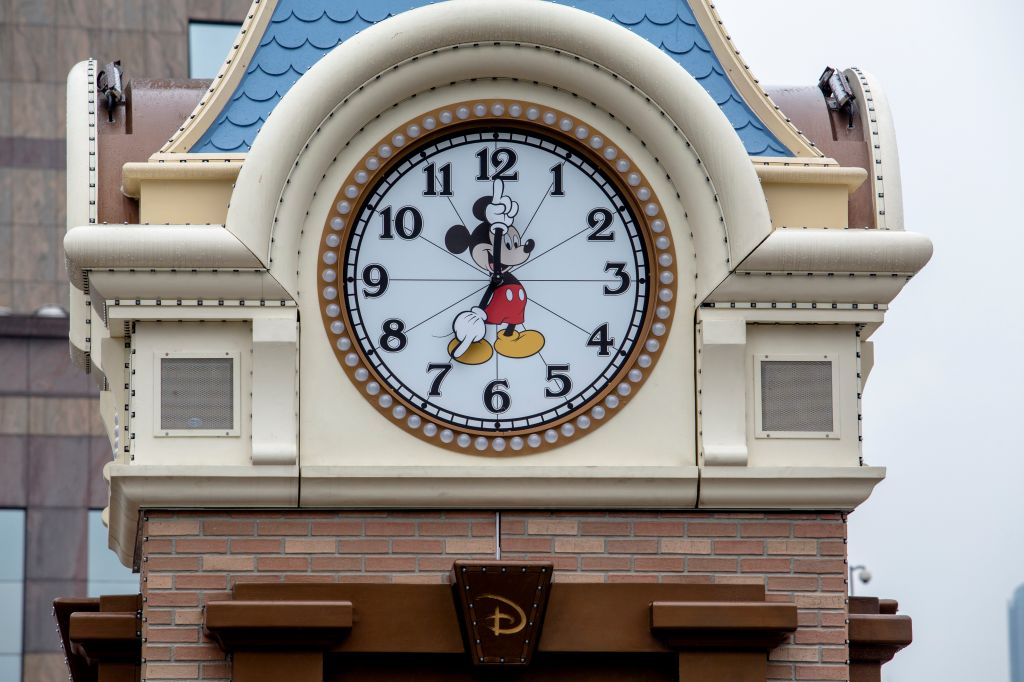 A Mickey Mouse Bell tower on the outdoor plaza. Disney...