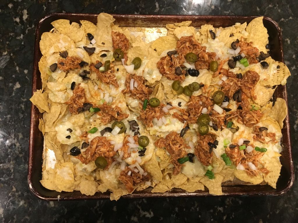 pulled chicken and queso nachos