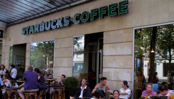 Paris, Boulevard de Sbastopol Starbucks Coffee tables chairs customers alfresco