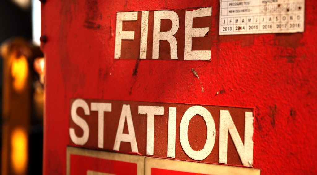 Close-Up Of Fire Station Sign