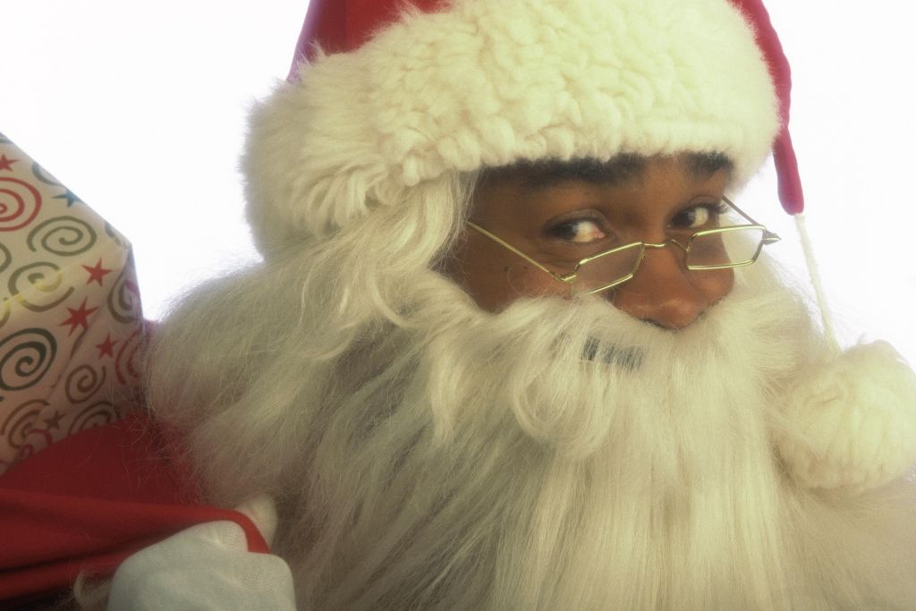 Santa holding bag of gifts