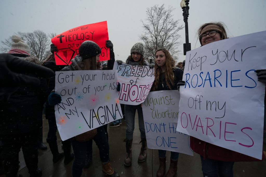 Pro-choice demonstrators stage a counter protest near the...