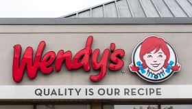 Wendy's sign. Entrance of an outlet of famous American fast...