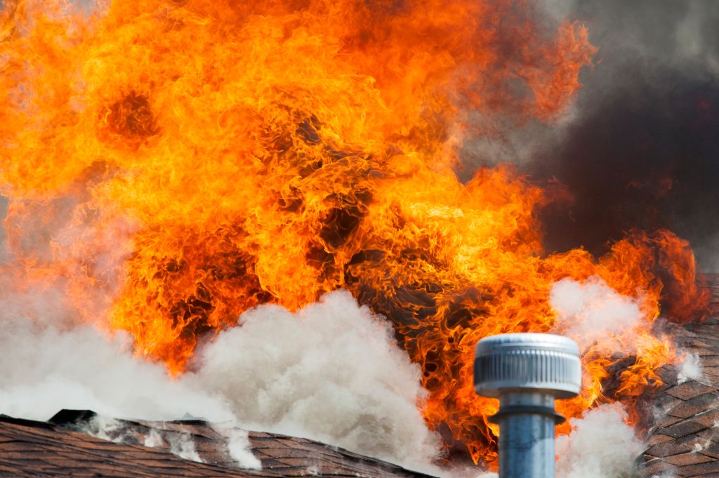 Flames of intense house fire