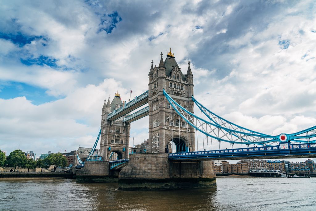 Low Angle View Of Tower Bridge Against Cloudy Sky