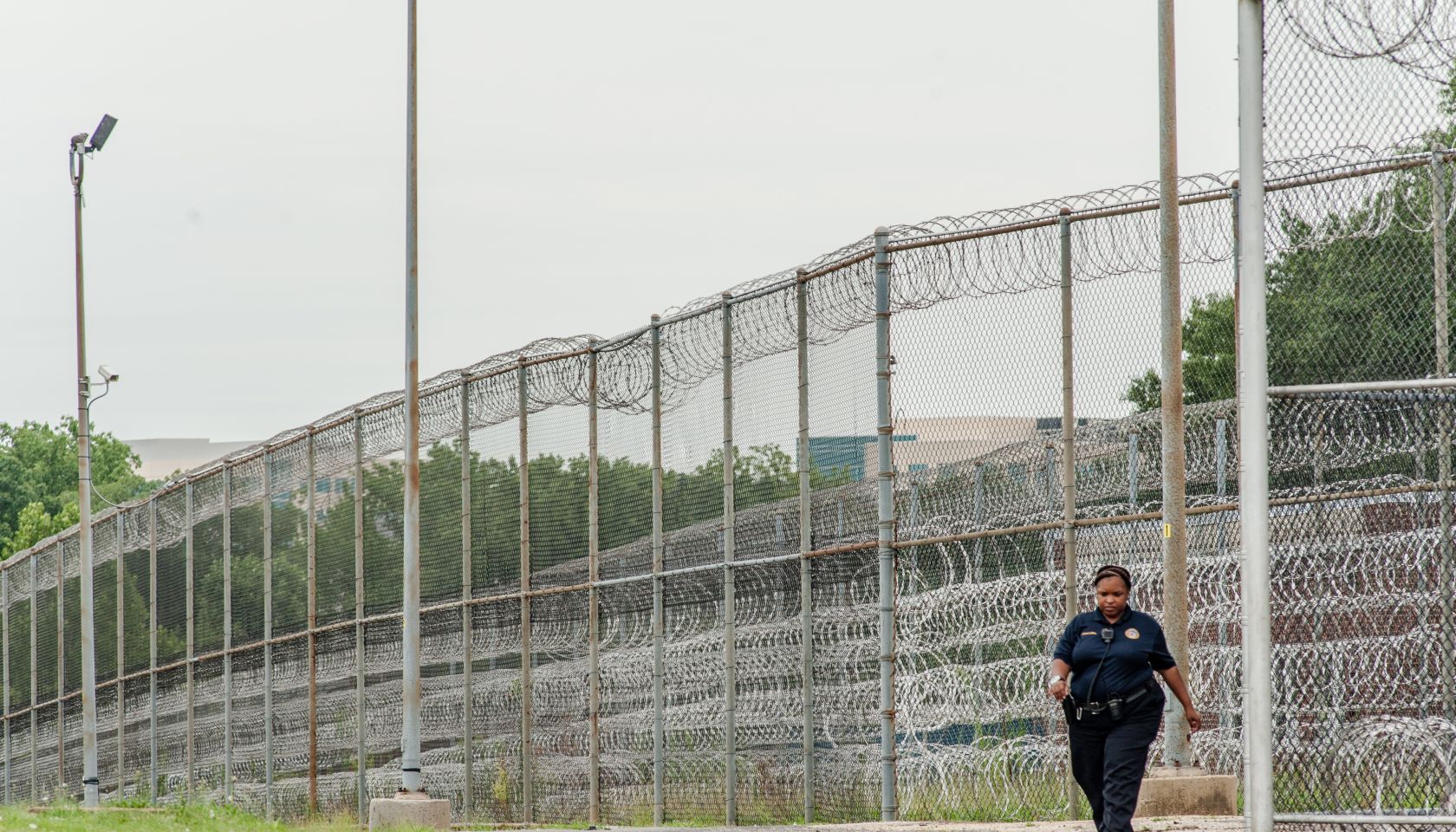 Stephen Moyer, Secretary of the Maryland Dept of Public Safety and Correctional Services, tours the Correctional Institution for Women with the warden, Margaret Chippendale.