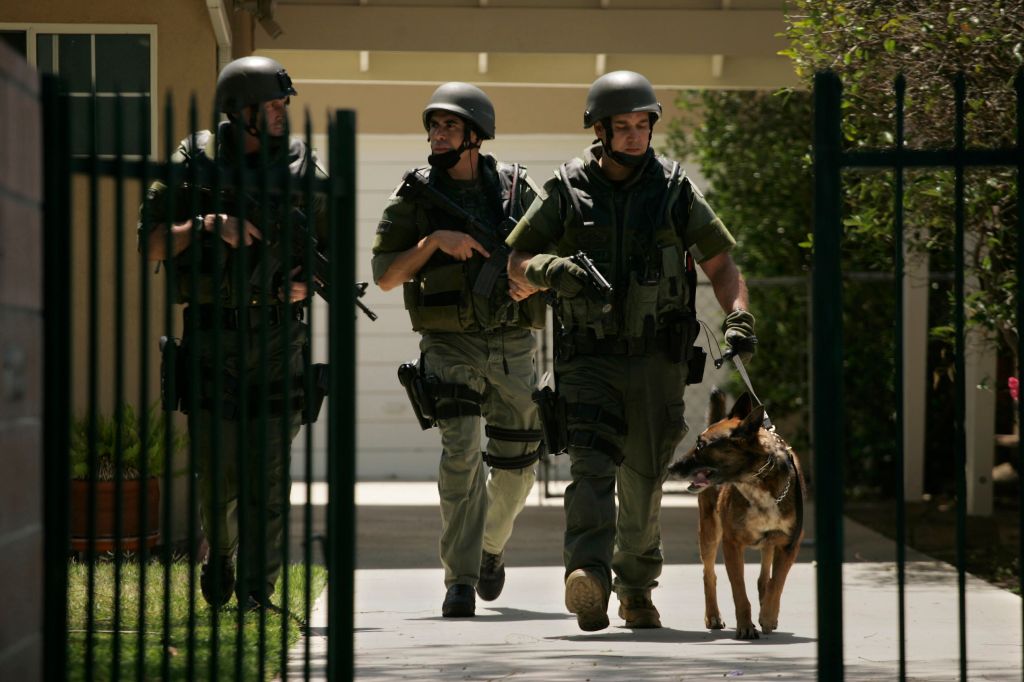 Los Angeles County Sheriff Swat Team search housetohouse on Kalisher St in Granad Hills on Friday