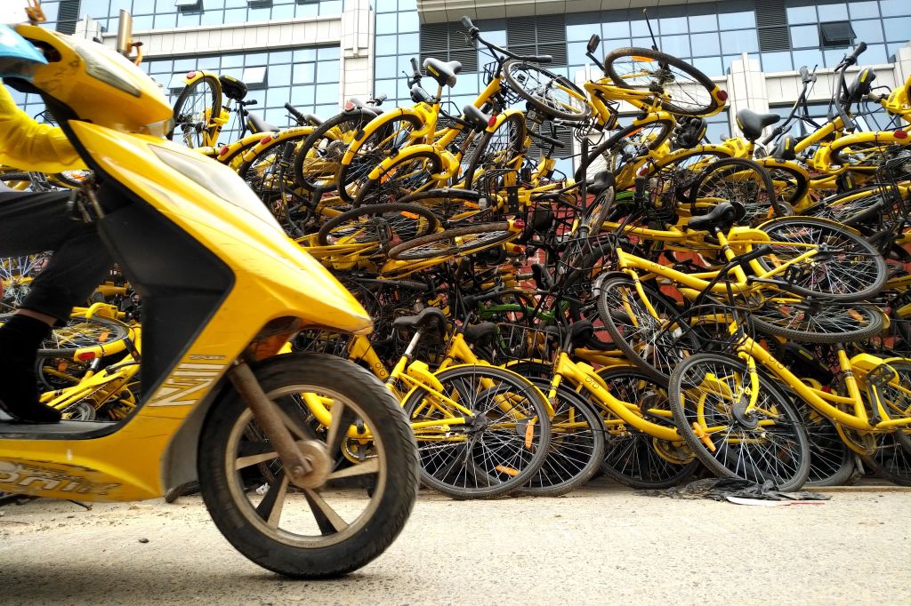 Shared Bikes Piled Up Along Street In Beijing