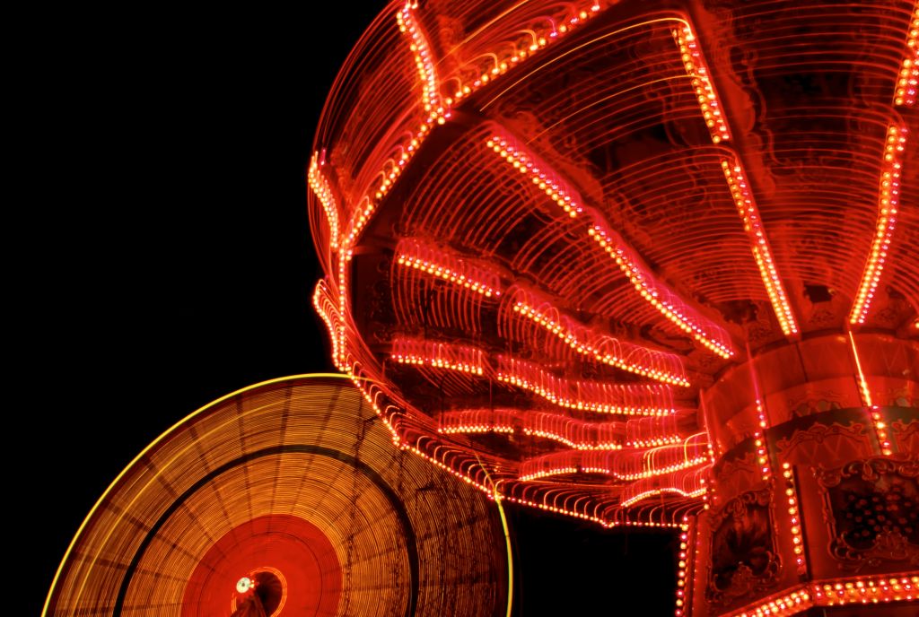 Spinning Amusement Park Rides at night.