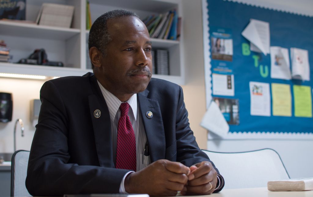 Carson, in return to Baltimore, backs sales of public housing to private developers
