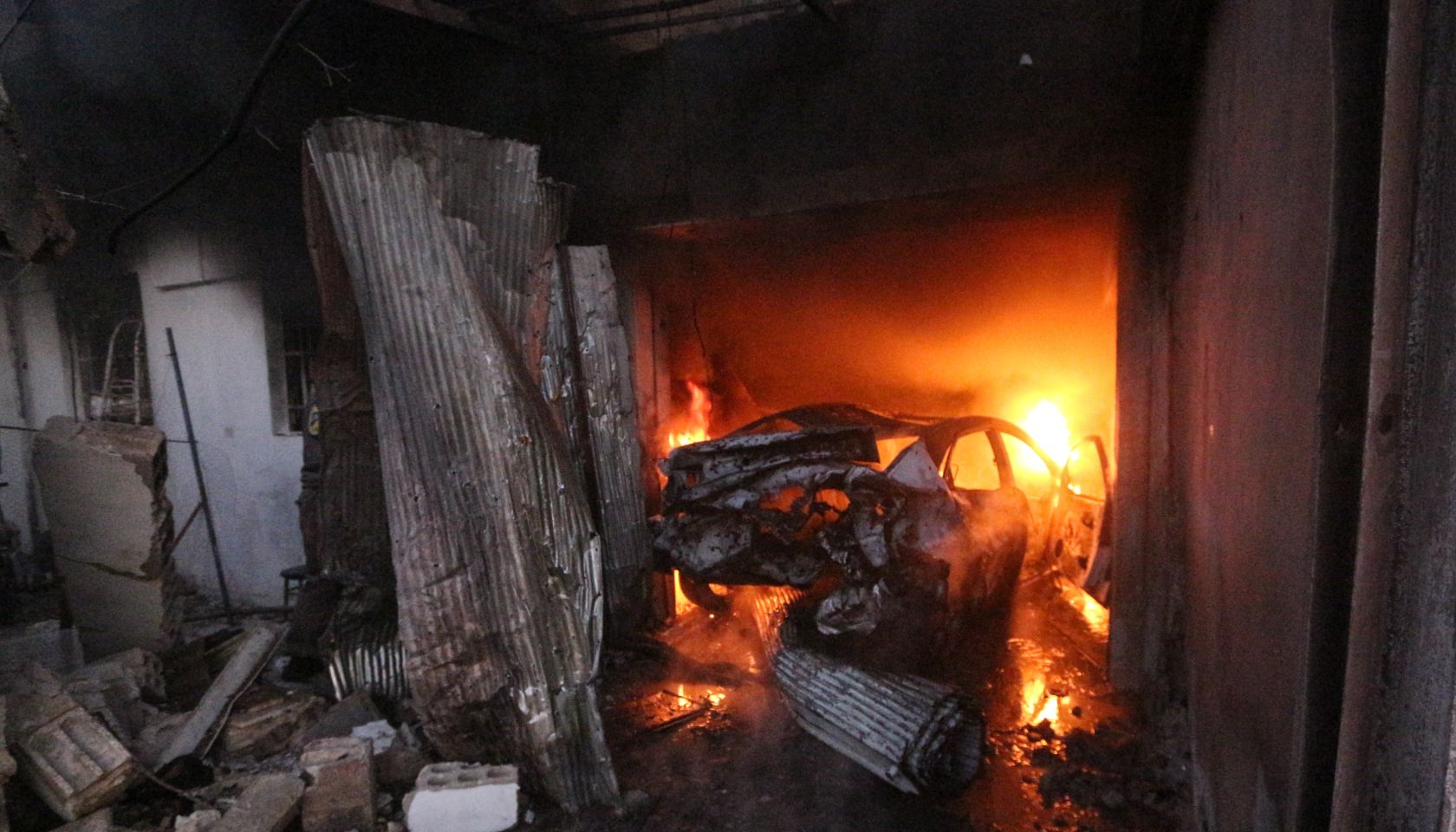 The car that was located in the garage of the house has...