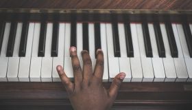 Cropped Hand Playing Piano