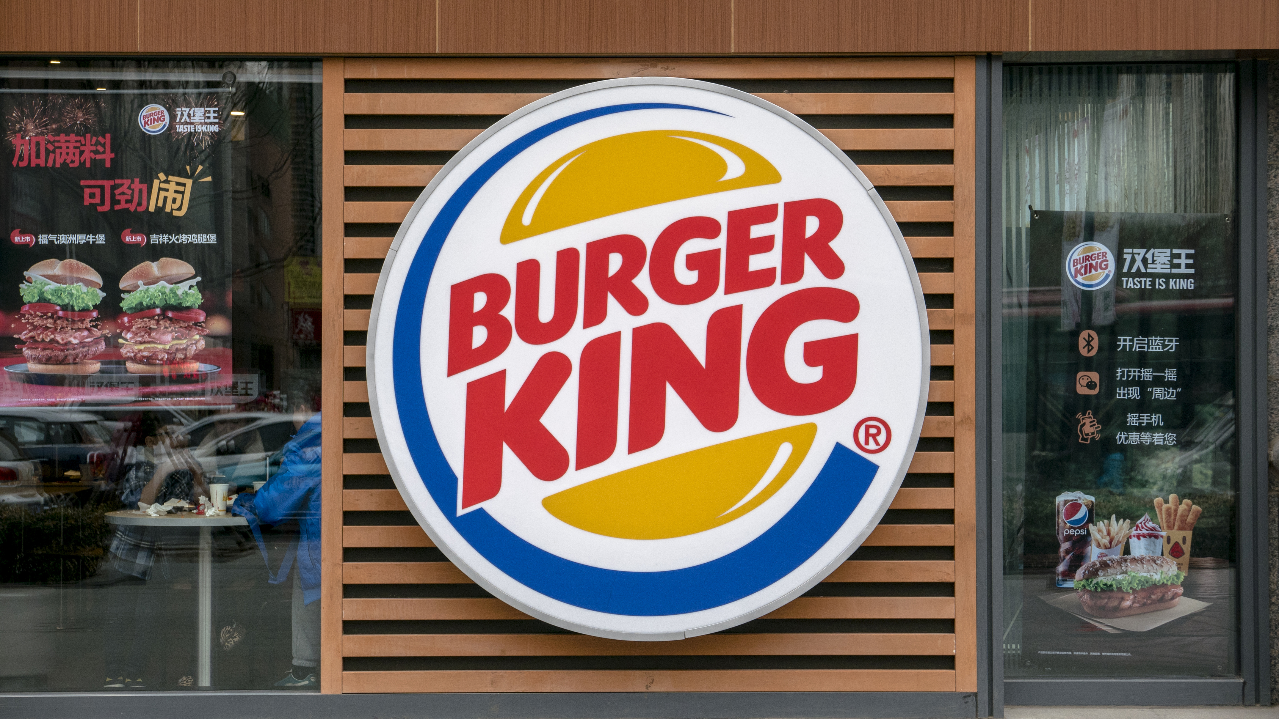 Logo of a Burger King restaurant. Burger King is on the...