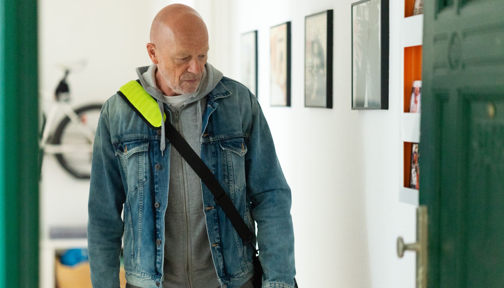 Senior man leaving apartment