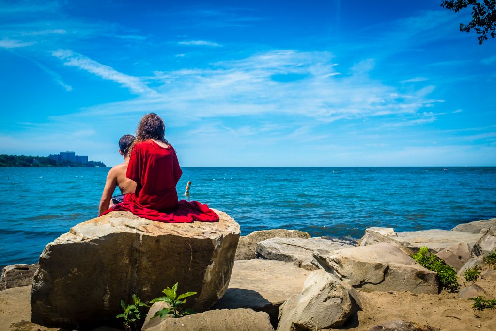 Couple sitting by the water