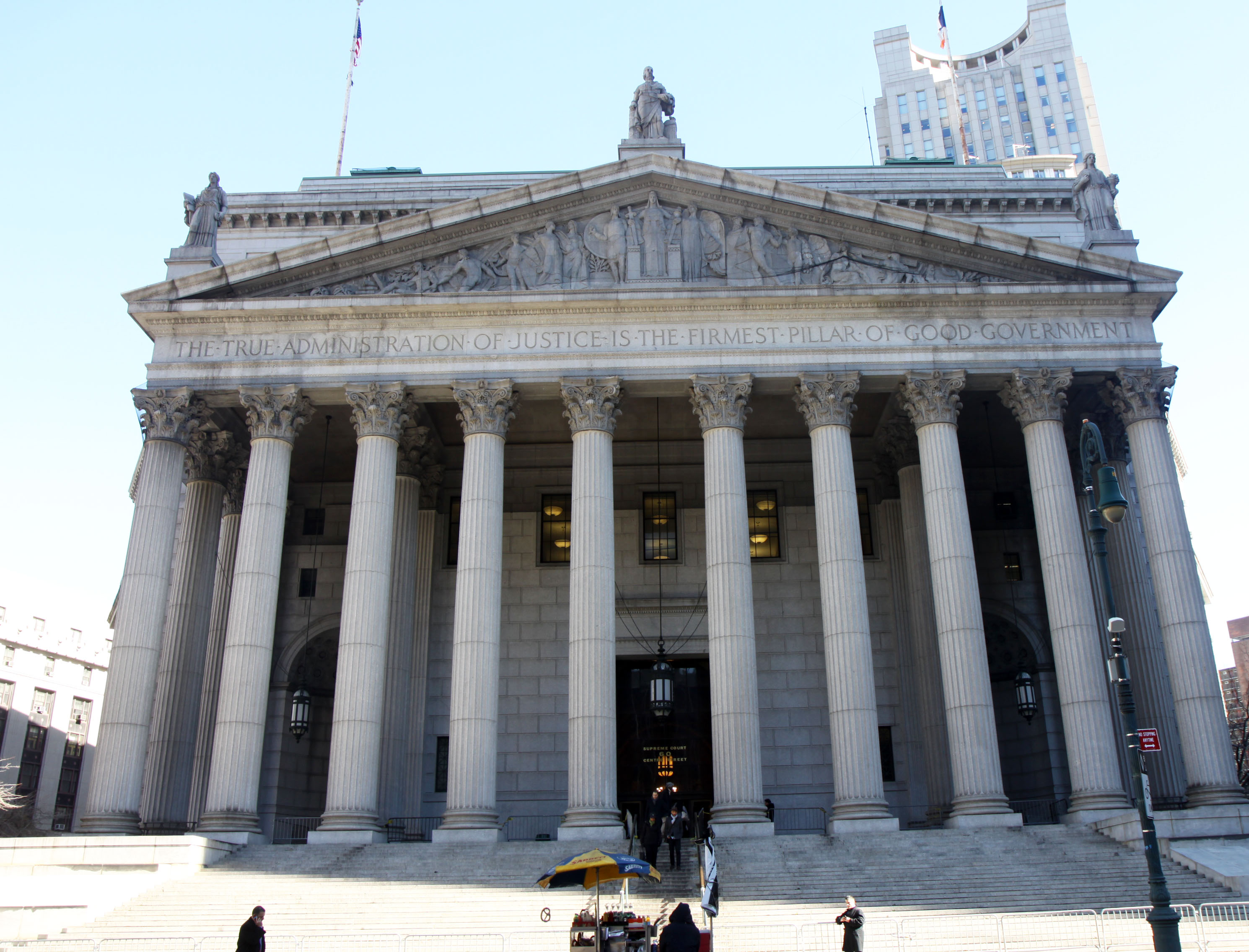 Members of the Press wait outside the New York State Supreme Court, with Madonna due to appear to fight her custody battle against former husband Guy Ritchie