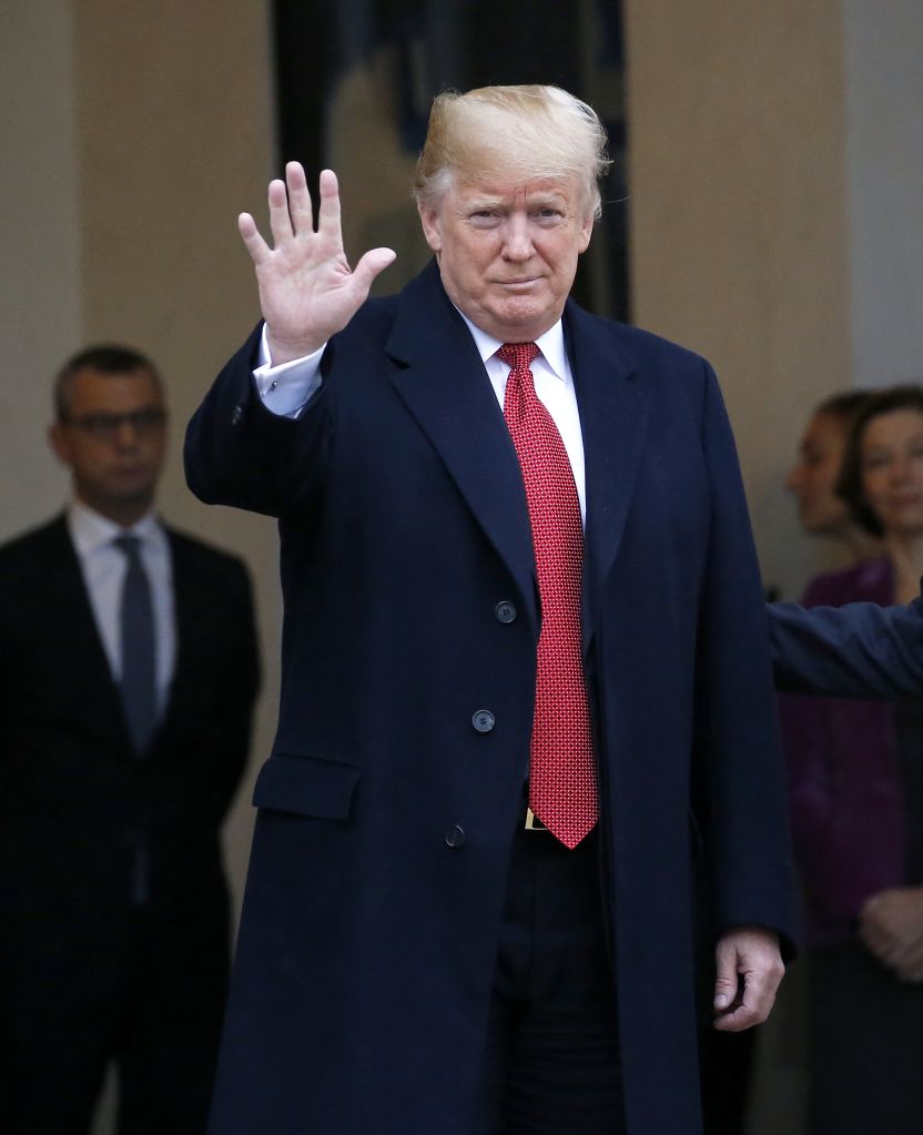 French President Emmanuel Macron welcomes U.S. President Donald Trump at Elysee Palace