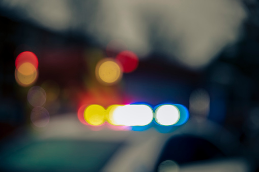 American flag and emergency lights