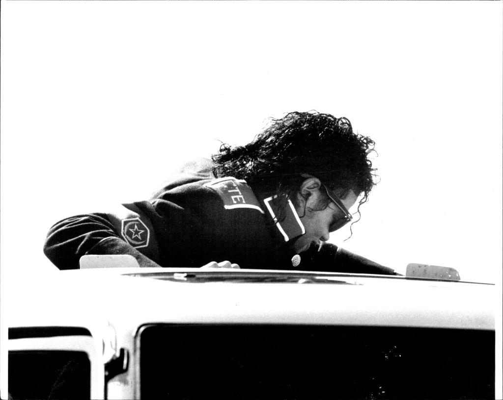 Michael Jackson arrives at Mascot from Melbourne.Jackson standing in back of Van.