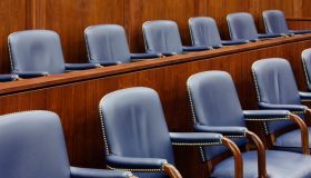 Empty Jury Seats in Courtroom