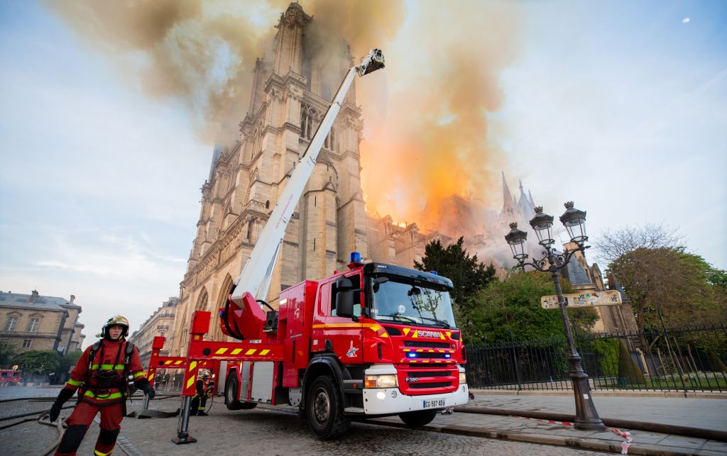 Firefighters tackle a major fire at the Notre Dame Cathedral in Paris