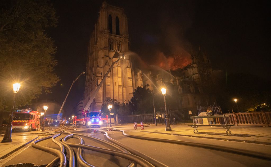 Firefighters tackle a major fire at the Notre Dame Cathedral in Paris