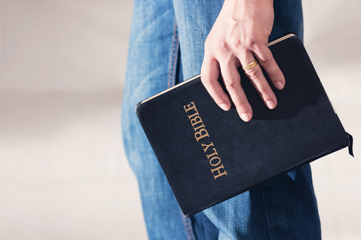 Man Holding Bible