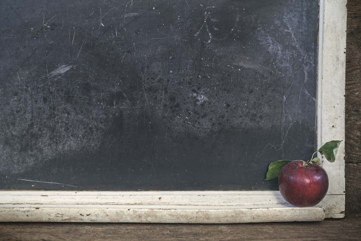 Apple Against Blackboard In Classroom