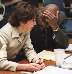 Prosecutors Marcia Clark (L) and Christopher Darde