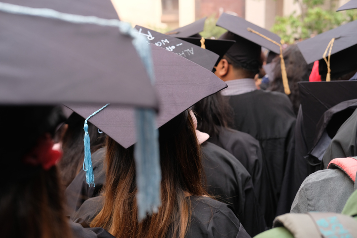young women with graduation hat