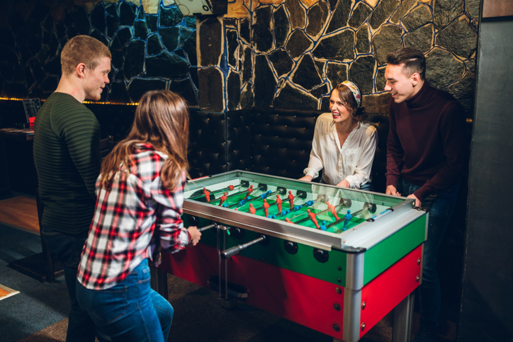 Playing table soccer