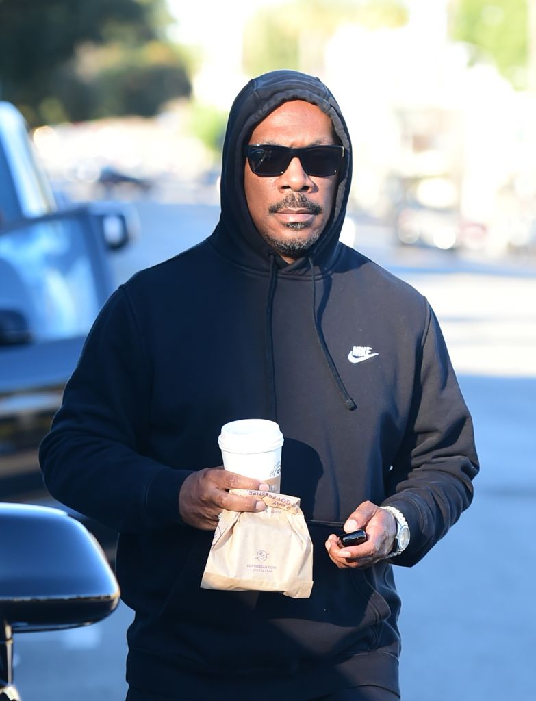 Eddie Murphy wears a Nike hoodie during an early morning coffee run