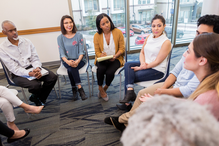 At the university center, a young woman speaks out