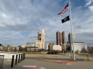 American Flag Over Downtown Columbus Ohio Skyline