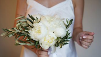 Midsection Of Bride Woman Holding Wedding Flower Bouquet