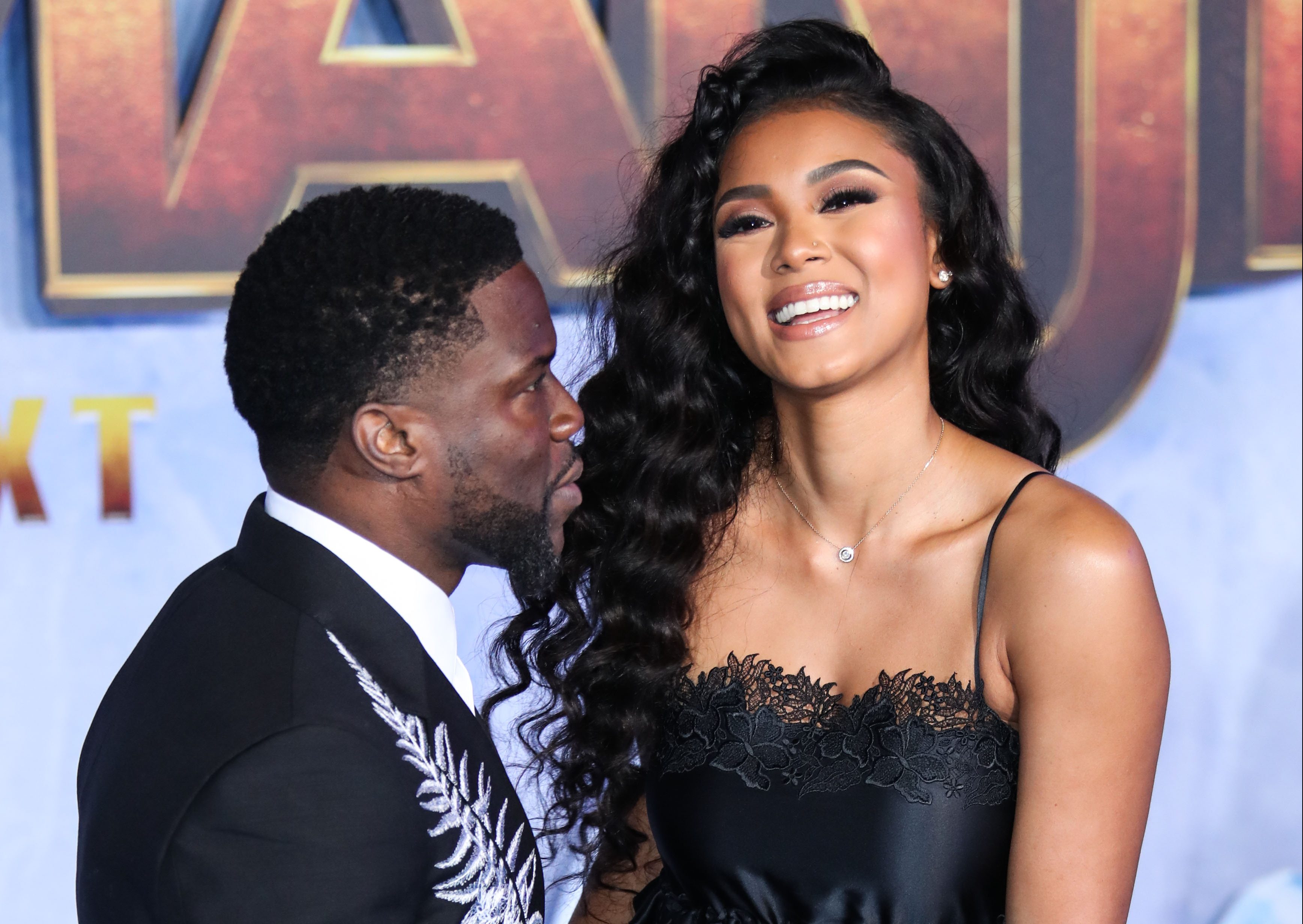 Actor Kevin Hart and wife Eniko Parrish arrive at the World Premiere Of Columbia Pictures' 'Jumanji: The Next Level' held at the TCL Chinese Theatre IMAX on December 9, 2019 in Hollywood, Los Angeles, California, United States.