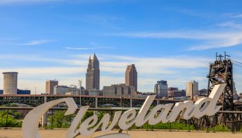 Cleveland script sign and city skyline - Tremont