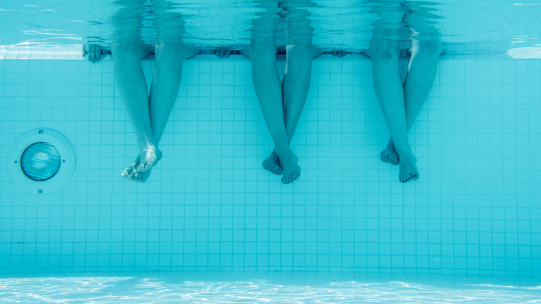 Low Section Of Women In Pool