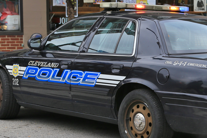 Close-up of a Cleveland police vehicle with flashing lights