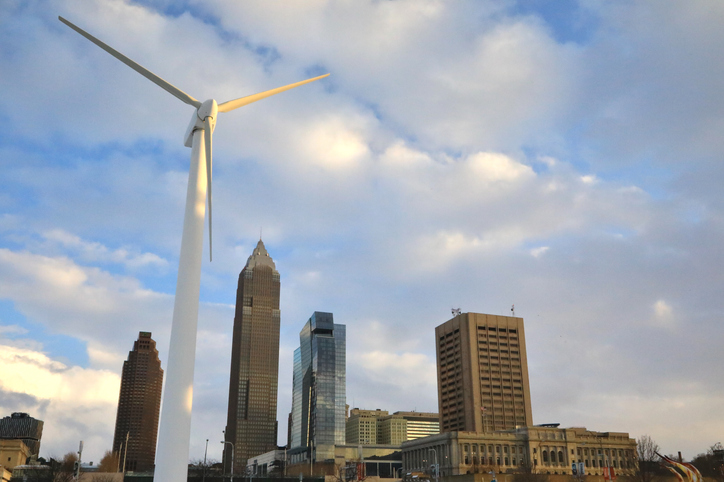 Downtown city buildings powered from a wind energy turbine