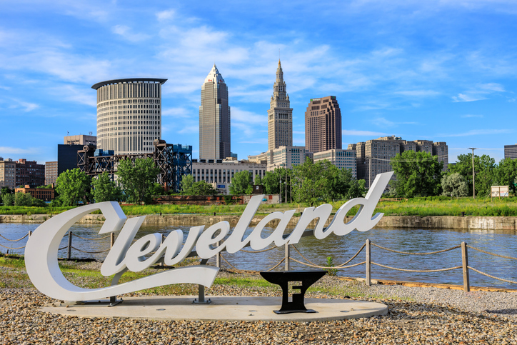 Cleveland script sign and city skyline - Flats West Bank