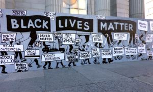 Black Lives Matter street sign depicting injustice and names of people killed by Police Brutality, New York City