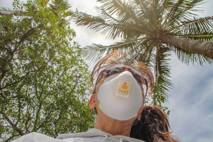 Woman wearing N95 Face Mask outdoors in Fort Lauderdale due to COVID-19 Pandemic