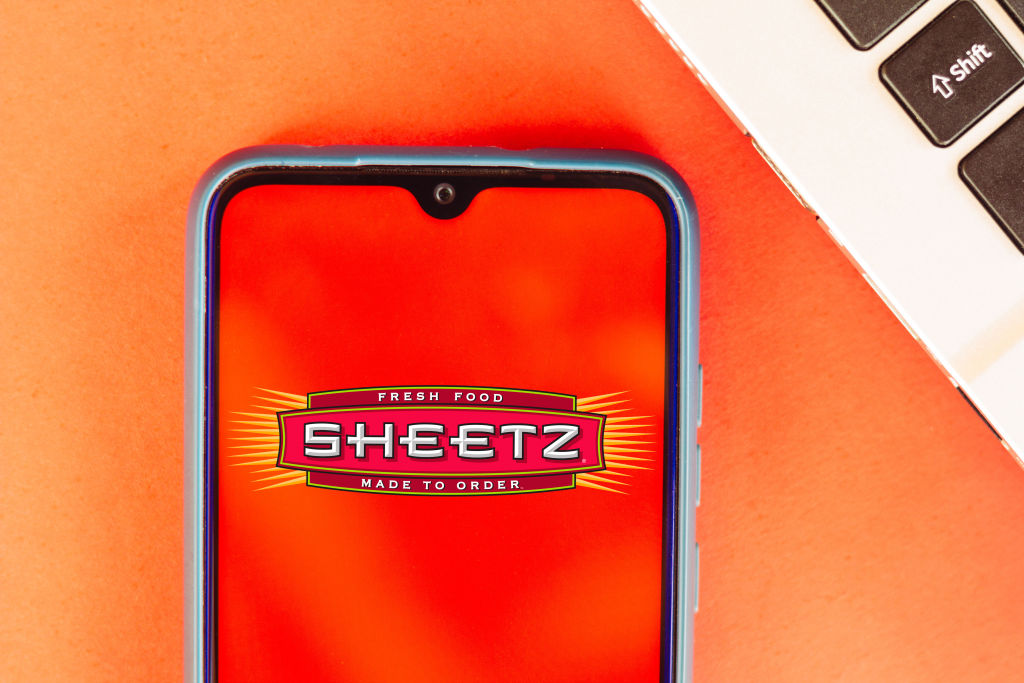 In this photo illustration the Sheetz logo seen displayed on...
