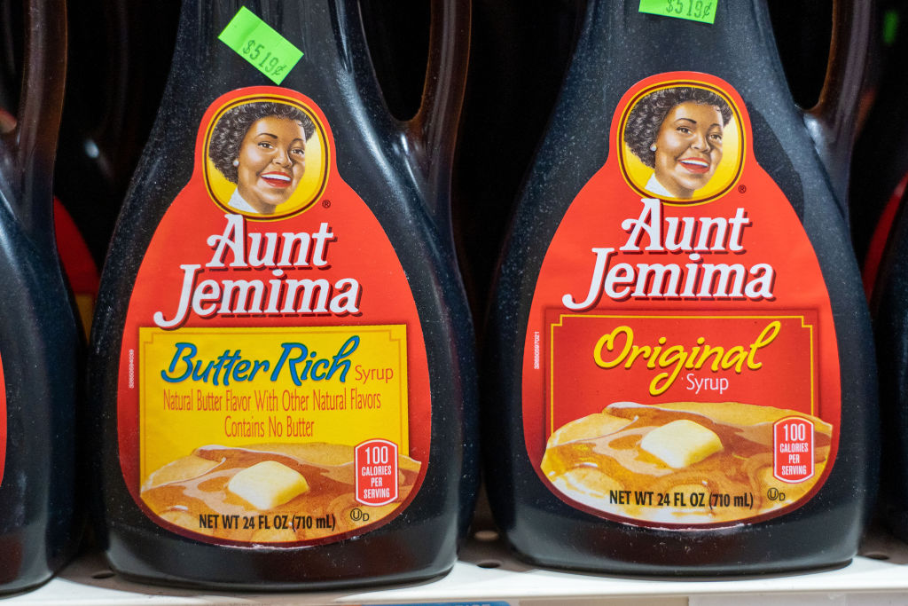 Aunt Jemima products seen displayed on supermarket shelves.