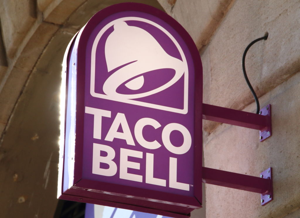 Taco Bell logo seen outside a branch in Paseo de Gracia...