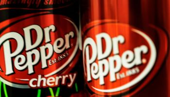 Cans of Dr Pepper. Dr Pepper is a soft drink created in the...